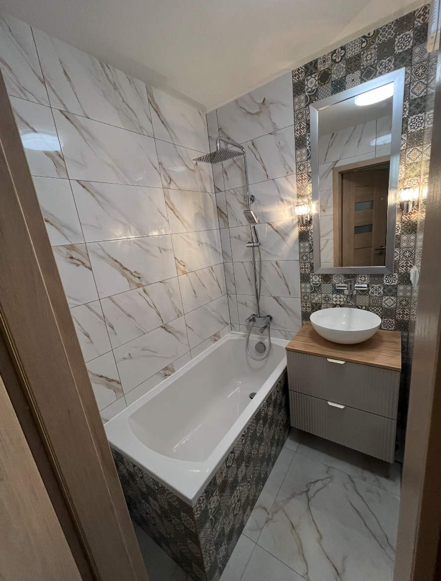 Remont łazienki Rubinkowo Toruń - nowoczesne płytki i armatura K&S Budownictwo